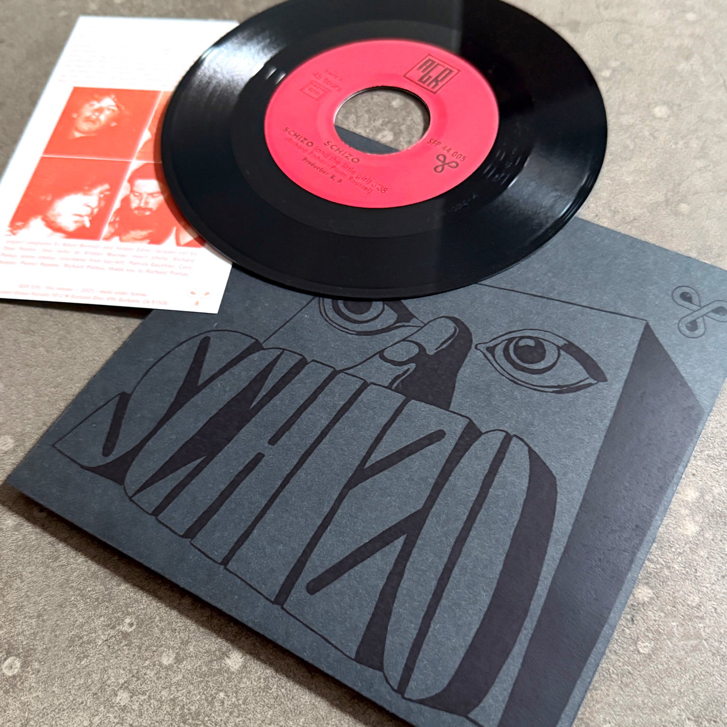 SCHIZO ---7"--- LENTICULAR FLIP-IMAGE COVER - BLACK SLEEVE - EDITION OF 35