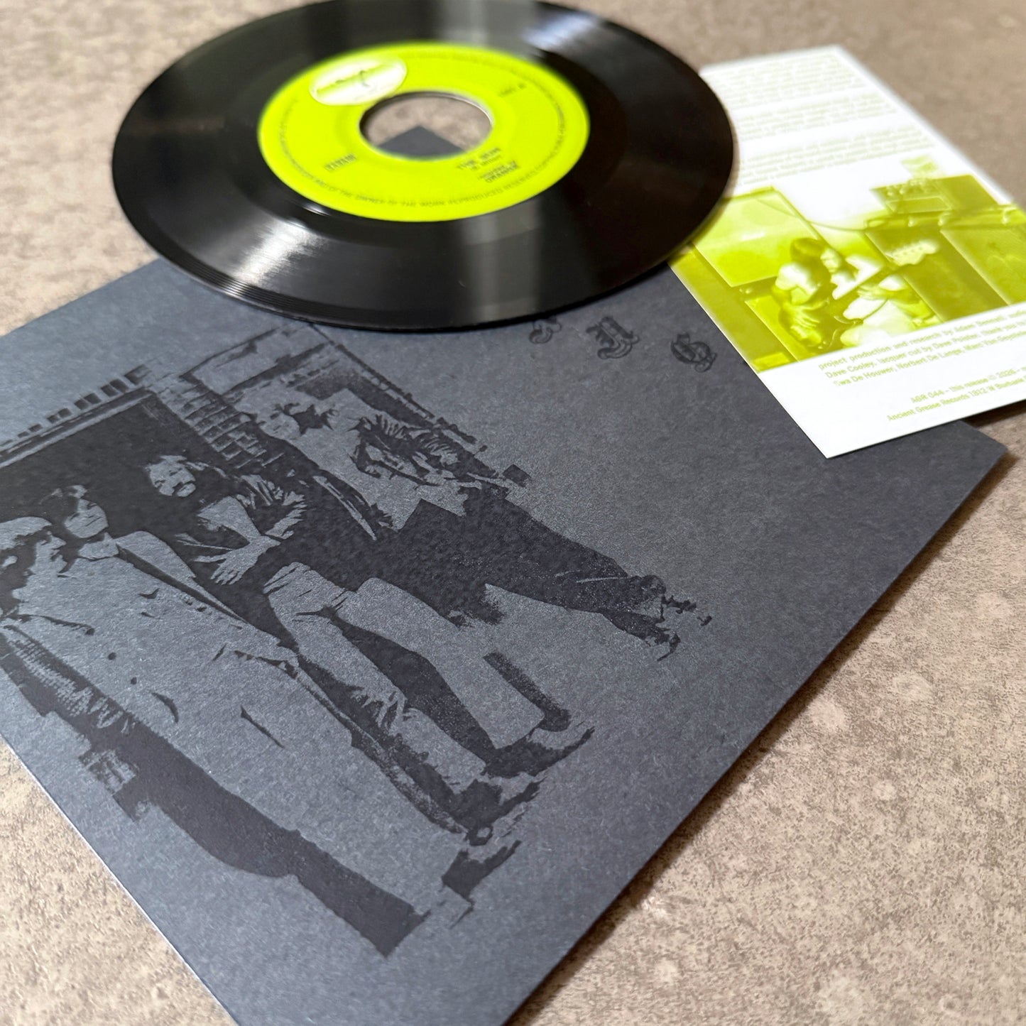 ORANGE ---7"--- LENTICULAR FLIP-IMAGE COVER - BLACK SLEEVE - EDITION OF 40