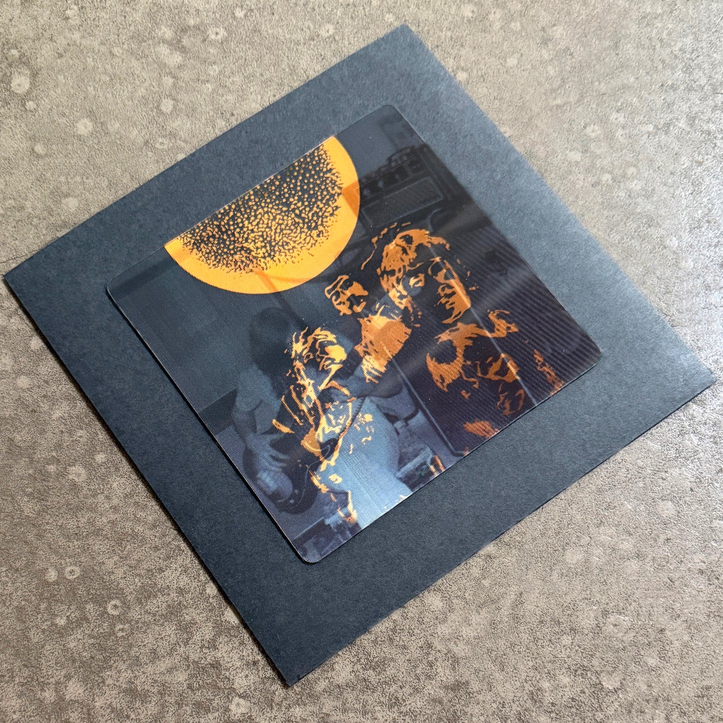 ORANGE ---7"--- LENTICULAR FLIP-IMAGE COVER - BLACK SLEEVE - EDITION OF 40